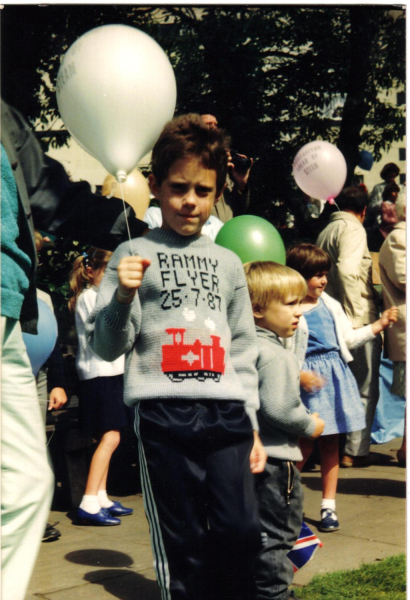 boy wearing first day of steam jumper 
14-Leisure-04-Events-007-Return of Steam 1987
Keywords: 1987