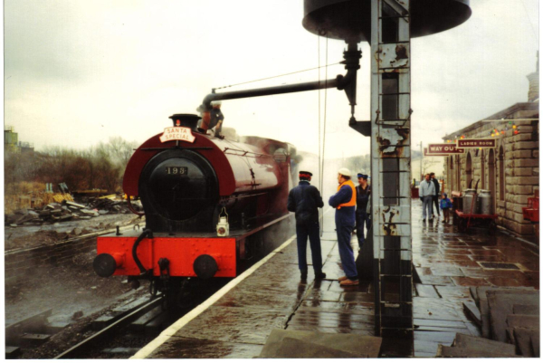 The Santa special being refilled with water 
16-Transport-03-Trains and Railways-000-General

Keywords: 1990