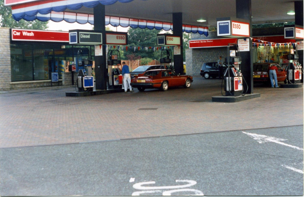 Filling up with petrol Stubbins Lane
17-Buildings and the Urban Environment-05-Street Scenes-027-Stubbins Lane and Stubbins area
Keywords: 1994