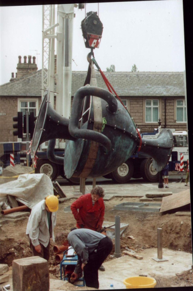 The Urn arrives 
17-Buildings and the Urban Environment-05-Street Scenes-017-Market Place
Keywords: 1998