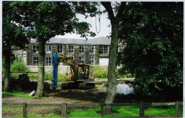 Repairing the weir 
17-Buildings and the Urban Environment-05-Street Scenes-021-Peel Brow area
Keywords: 0