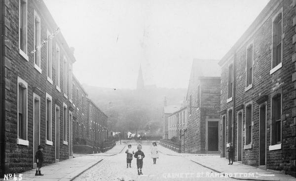 Garnett Street Ramsbottom. Pc dated 27 AUG 1917, Holcombe Church (Emmanuel) in the background 
17-Buildings and the Urban Environment-05-Street Scenes-033-Garnett Street area
Keywords: 1945