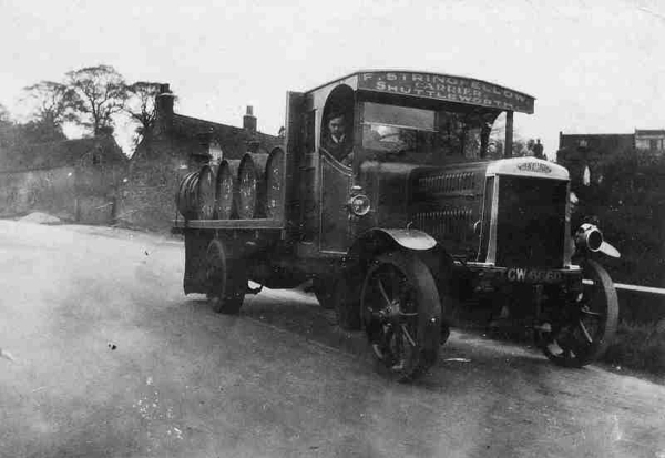 1925/1930  3 pics of lorry owned by Fred Stringfellow, carrier from Shuttleworth. It has solid tyres, & oil lamps.  Back contains drums used by Kay's Soap works. 
17-Buildings and the Urban Environment-05-Street Scenes-006-Carr Street and Tanners area
Keywords: 1945