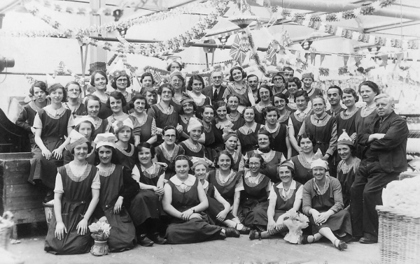 Winding operatives, cotton side at Porritt and Spencer, Stubbins Vale  a celebration 1930's.Either George V Silver Jubilee 1935 or George VI  Coronation  1937 note uniforms
17-Buildings and the Urban Environment-05-Street Scenes-027-Stubbins Lane and Stubbins area
Keywords: 1945