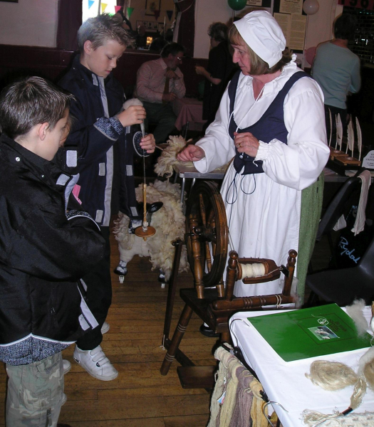 Spinning a yarn at the R.H.S 20th Anniversary event 
01-Ramsbottom Heritage Society-01-RHS Activities-017-2007 20th Annivresary in Civic Hall
Keywords: 2007