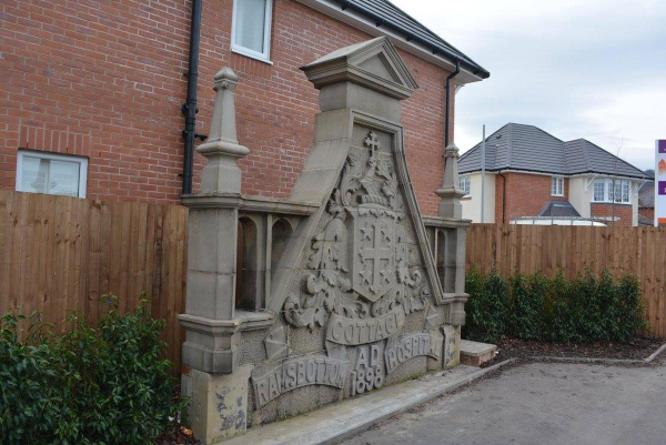  after the Cottage Hospital was demolished a new housing estate was built. The seven foot pediment from the top of the original hospital building, which features a family crest of the Aitken family has been removed, cleaned and replaced at the entrance of
17-Buildings and the Urban Environment-05-Street Scenes-019-Nuttall area
Keywords: 2016