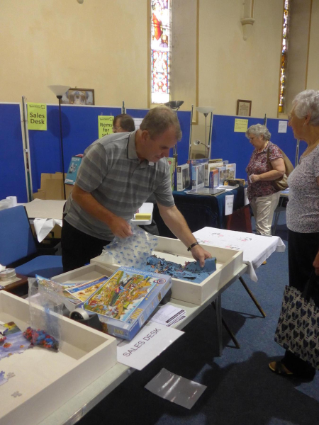 Jigsaw Festival at St Paul's 6 Sep 16 - Packing up a bought puzzle
06-Religion-01-Church Buildings-001-Church of England  - St. Paul, Bridge Street, Ramsbottom
Keywords: 2016
