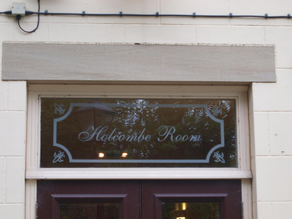 Window over door to Holcombe Room Civic Hall 
07-Government and Politics-02-Government and Public Buildings-001-Civic Hall
Keywords: 2019