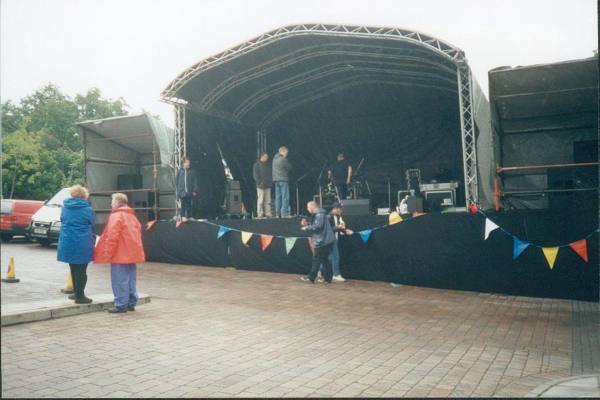 Millennium Festival - setting up the stage
01-Ramsbottom Heritage Society-01-RHS Activities-016 Millennium Festival
Keywords: 2000