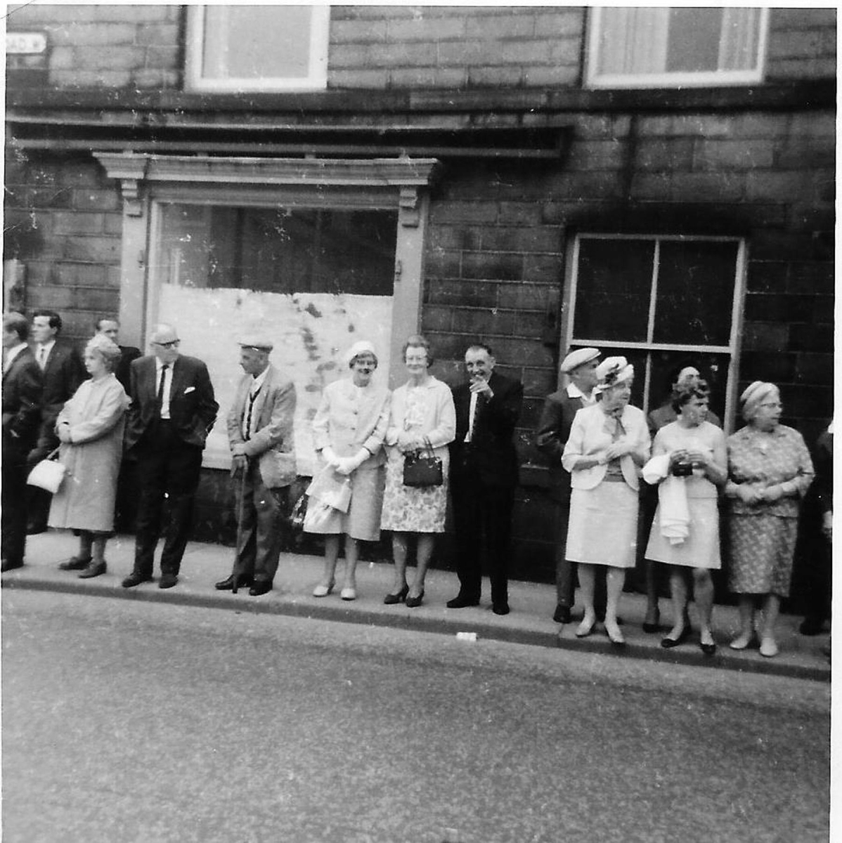 People waiting for a procession outside Barcroft pork butchers shop on Bolton Road West taken 1960s  
03 - Shops, Restaurants & Hotels - 02 - Individual shops
Keywords: Bury-Archive