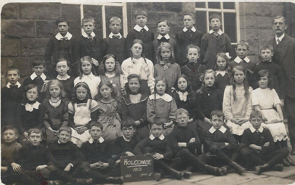 Holcombe School - Phot of pupils with teacher catalogued at Bury Archives as RHS/21/5/1/69
05-Education-01-Primary Schools-001-Emanuel Holcombe Church of England Primary School
Keywords: 0