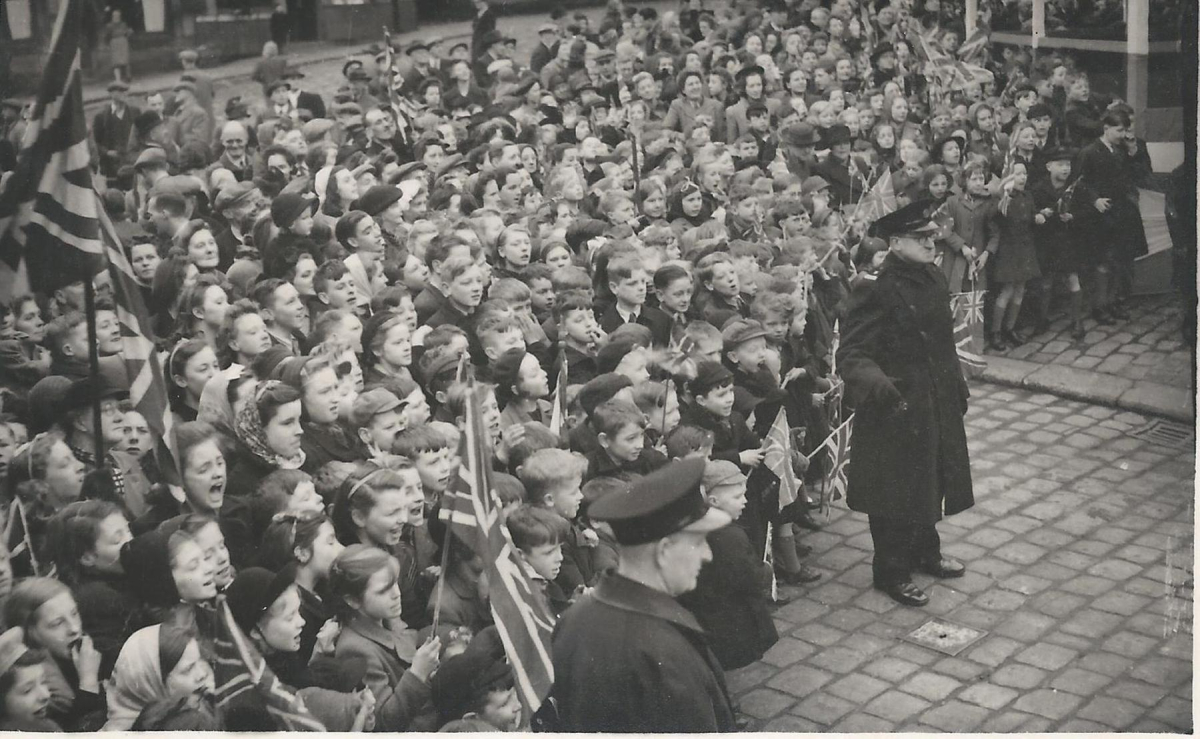 King George and Queen Elizabeth's visit to Ramsbottom 8th March 1945.  Scenes in the Market place - from an album of Mr. G. Holt, Chair of the Council. 
15 - War - 02 - World War 2
Keywords: Bury-Archive