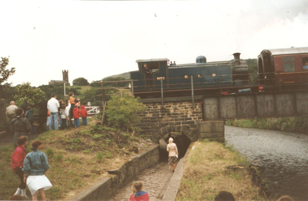 E.Lancs Rail (ELR) steam train crossing Irwell Nuttall bridge St.Andrews Church in background digitised 
16 - Transport - 03 - Trains and Railways
Keywords: Bury-Archive