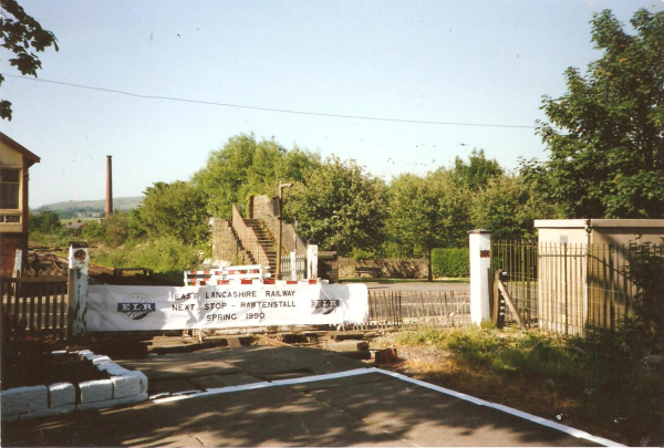 Ramsbottom ELR level crossing 1989 ad future extension N. The line to Rawtenstall was being built for opening in 1991. Shows old footbridge over the line. 
16 - Transport - 03 - Trains and Railways
Keywords: Bury-Archive
