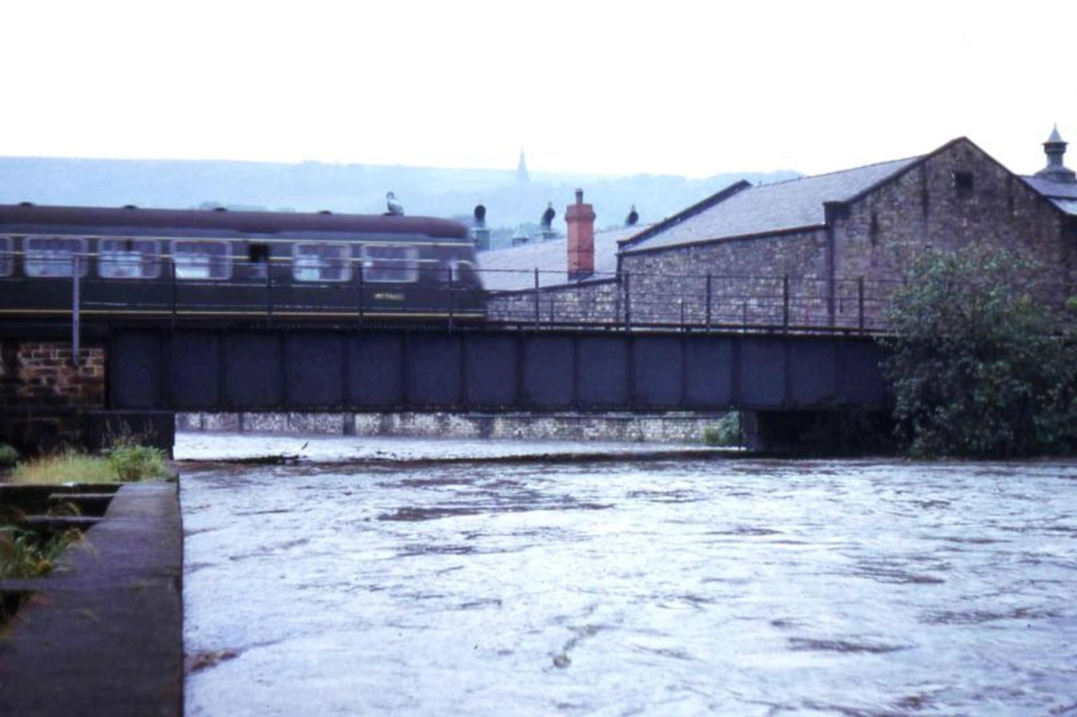 August Bank Holiday weekend 1964 â€“the railway bridge at Square Works. The Irwell was about 10 feet above normal. 
16 - Transport - 03 - Trains and Railways
Keywords: Bury-Archive