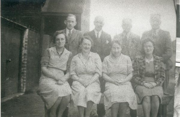 1930s, Flan, Hope Mill.  4 women workers & 4 foremen [two of women are Alice Howarth & Doris Bower] [after closure of Rose Mill & Holme Mill] 
02-Industry-01-Mills-025-Hope Mill, Bolton Road West
Keywords: 1985