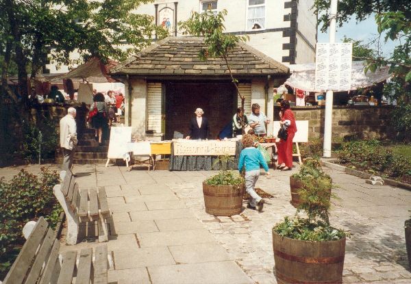 RHS Market Square stall 30 May 1988(Peel Lions Market day) (2 photos) 
01-Ramsbottom Heritage Society-01-RHS Activities-000-General
Keywords: 0