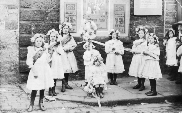 From Around Ramsbottom Page 27, maypole dancers outside the Empire Theatre on Railway Street 
17-Buildings and the Urban Environment-05-Street Scenes-022-Railway Street

Keywords: 1930