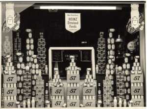 Window of Tom Jackson's Grocers shop, display as a play on Heinz 57 Varieties. Bolton Road West, opposite Holcombe Brook Methodist Chapel   1957 
17-Buildings and the Urban Environment-05-Street Scenes-002-Bolton Road West
Keywords: 0