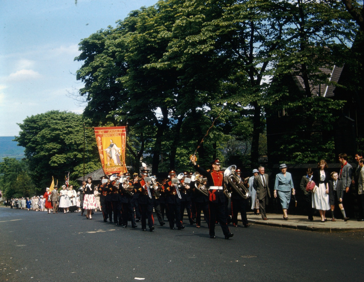 Whit Walk Bolton Street towards St Andrews school- 1960s - New Jerusalem Sunday School banner - church closed in 1970 donated by Tony Tickle via Facebook. 
The photographer was John Geoffrey Duckworth who was Chief Engineer for Ramsbottom Urban District Council.  Photo taken on slide in the 1960s 06-Religion-03-Churches Together-001-Whit Walks
Keywords: 0